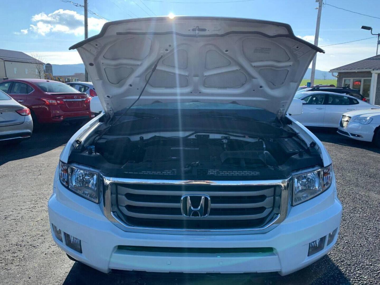 2014 White Honda Ridgeline (5FPYK1F54EB) with an 3.5L V6 3.5L V6 engine, located at 4845 Woodbury Pike, Roaring Springs, PA, (814) 317-5008, (814) 317-5008, 40.250935, -78.366959 - Photo#8