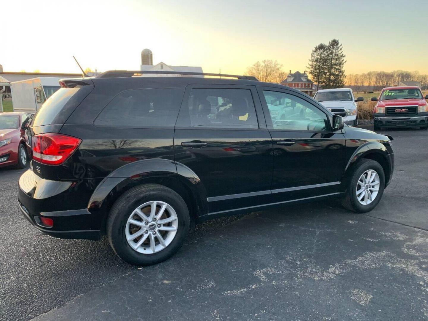 2017 Black Dodge Journey (3C4PDCBG9HT) with an 3.6L V6 3.6L V6 engine, located at 4845 Woodbury Pike, Roaring Springs, PA, (814) 317-5008, (814) 317-5008, 40.250935, -78.366959 - 2017 Dodge Journey SXT , automatic, FWD, third row, 98k, power windows/locks, cruise/tilt wheel, air conditioning, V6, like new tires, new inspection and more. Super clean! Must see to appreciate! Will come with a warranty with the option to upgrade. If interested, please call 814-317-5008. - Photo#1