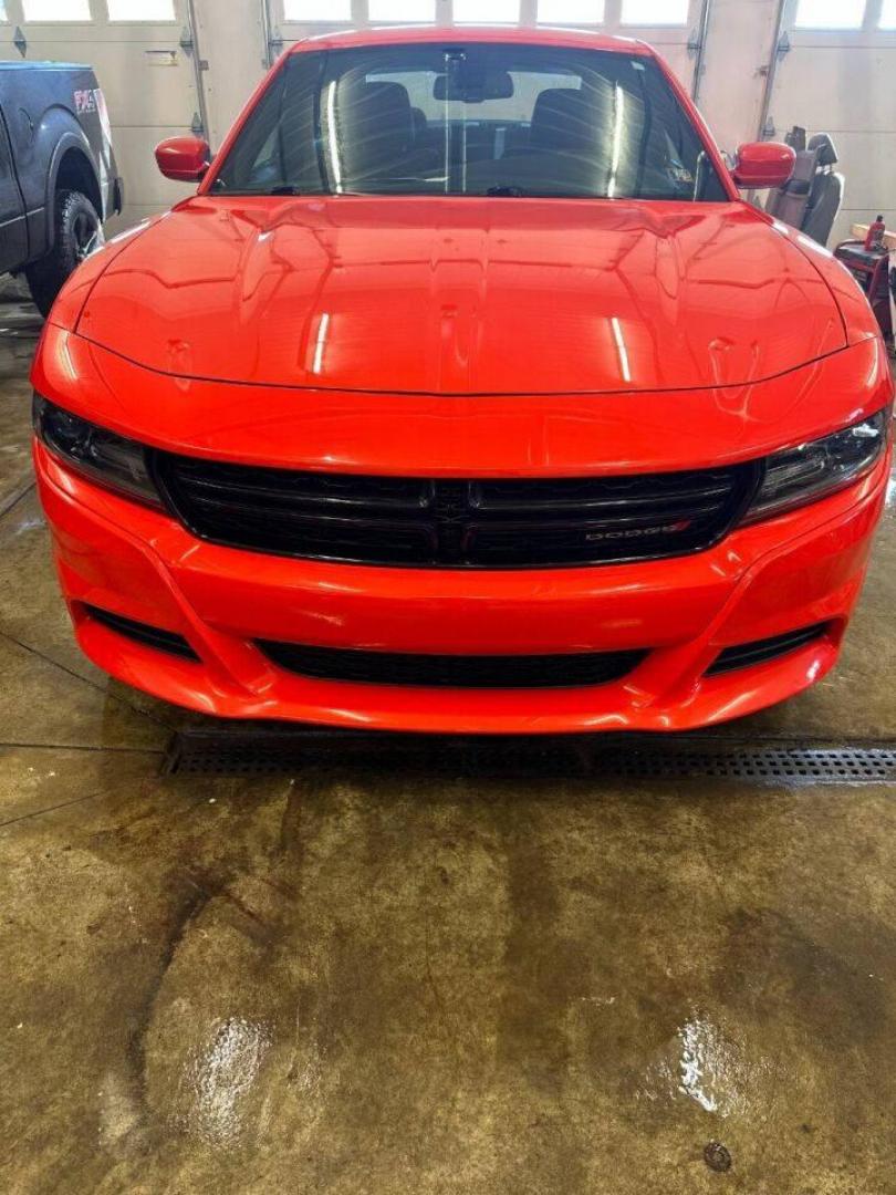 2018 Orange Dodge Charger (2C3CDXHG9JH) with an 3.6L V6 3.6L V6 engine, located at 4845 Woodbury Pike, Roaring Springs, PA, (814) 317-5008, (814) 317-5008, 40.250935, -78.366959 - Photo#0