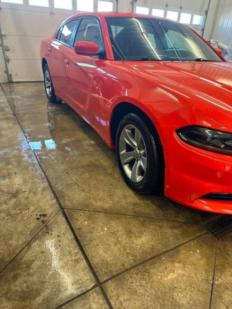 2018 Orange Dodge Charger (2C3CDXHG9JH) with an 3.6L V6 3.6L V6 engine, located at 4845 Woodbury Pike, Roaring Springs, PA, (814) 317-5008, (814) 317-5008, 40.250935, -78.366959 - Photo#1