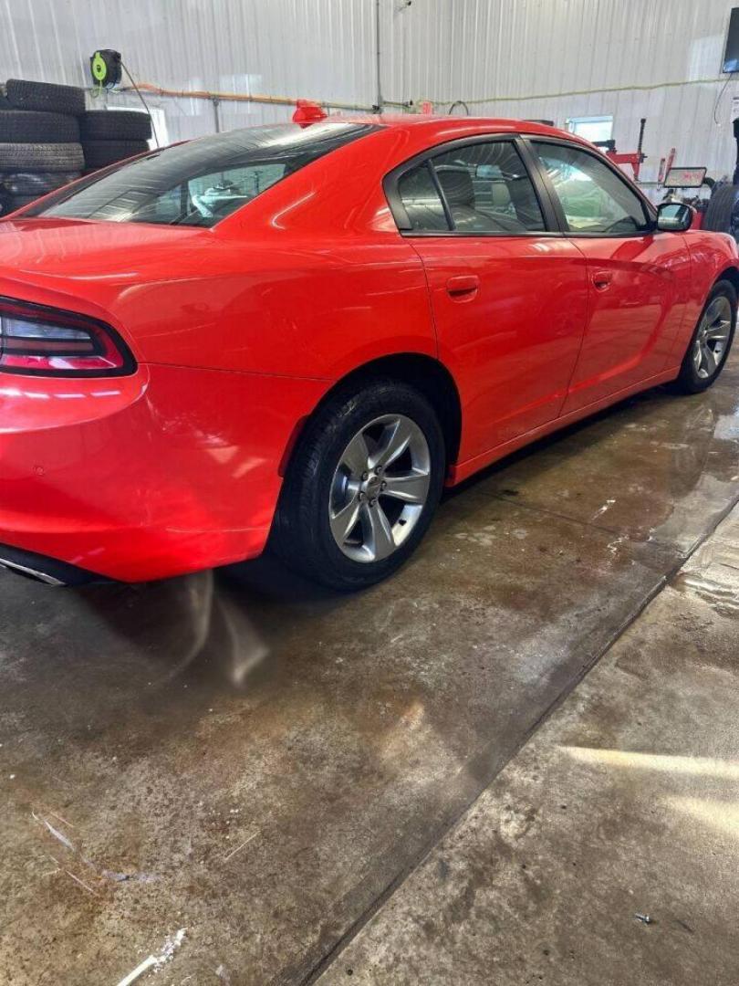 2018 Orange Dodge Charger (2C3CDXHG9JH) with an 3.6L V6 3.6L V6 engine, located at 4845 Woodbury Pike, Roaring Springs, PA, (814) 317-5008, (814) 317-5008, 40.250935, -78.366959 - Photo#2