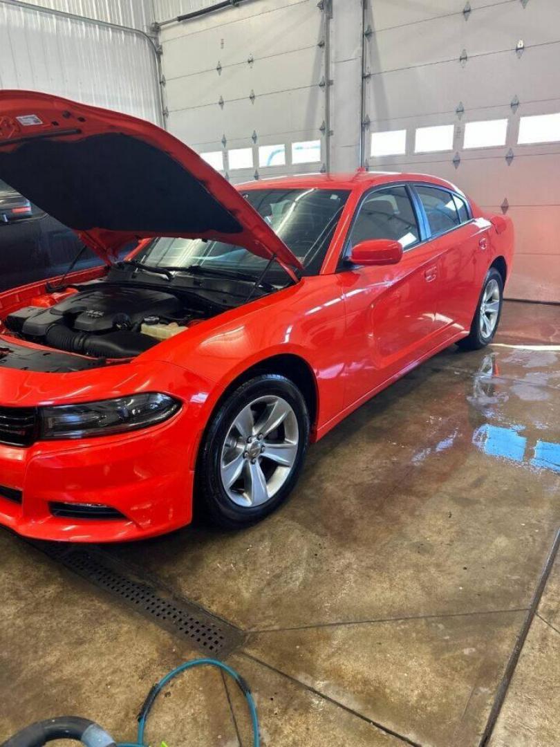 2018 Orange Dodge Charger (2C3CDXHG9JH) with an 3.6L V6 3.6L V6 engine, located at 4845 Woodbury Pike, Roaring Springs, PA, (814) 317-5008, (814) 317-5008, 40.250935, -78.366959 - Photo#3