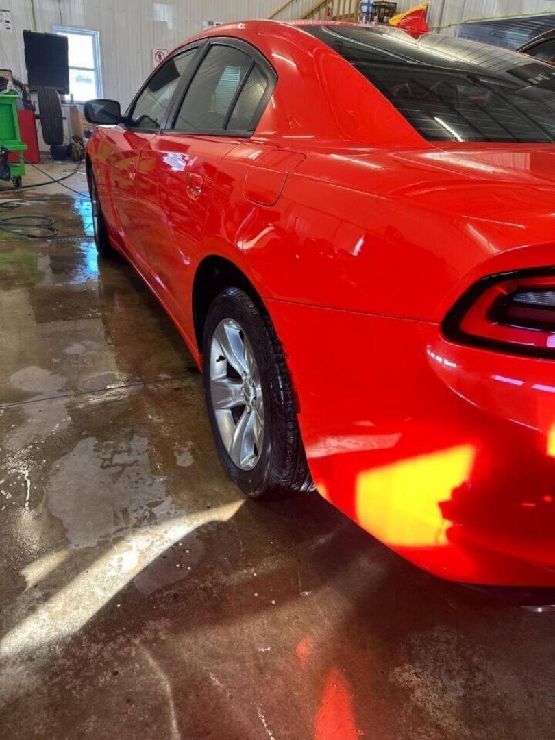 2018 Orange Dodge Charger (2C3CDXHG9JH) with an 3.6L V6 3.6L V6 engine, located at 4845 Woodbury Pike, Roaring Springs, PA, (814) 317-5008, (814) 317-5008, 40.250935, -78.366959 - Photo#4