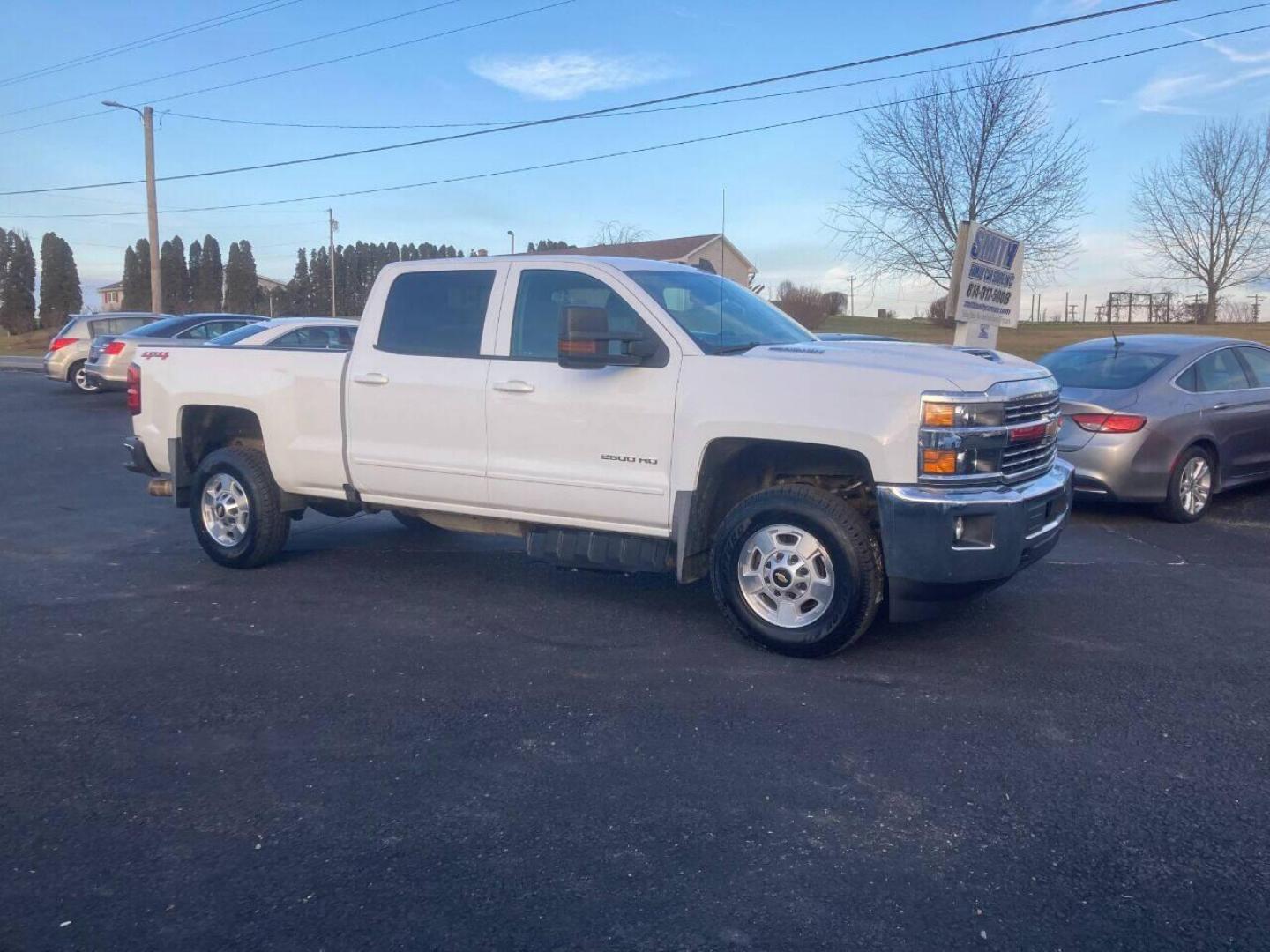 2018 White Chevrolet Silverado 2500HD (1GC1KVEY9JF) with an 6.6L V8 Turbocharger 6.6L V8 engine, located at 4845 Woodbury Pike, Roaring Springs, PA, (814) 317-5008, (814) 317-5008, 40.250935, -78.366959 - 1 Owner company leased! 2018 Chevy Silverado 2500 LT, automatic, 4x4, 6.6L, V8, Diesel, power windows/locks, cruise/tilt wheel, air conditioning, rear back up camera, has gooseneck flip down ball hitch, new brakes/rotors, new tires, new inspection. Truck was well maintained! Southern, Rust Free tru - Photo#0