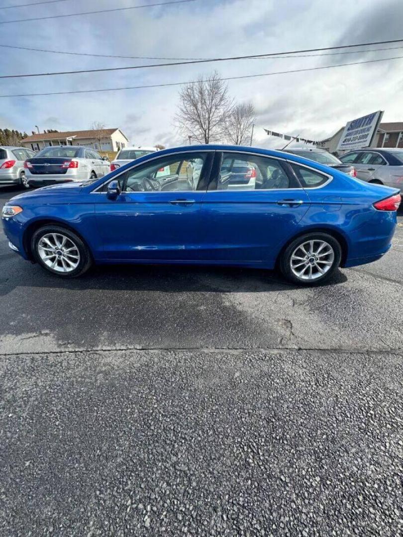 2017 Blue Ford Fusion (3FA6P0HD7HR) with an 1.5L I4 Turbocharger 1.5L I4 engine, located at 4845 Woodbury Pike, Roaring Springs, PA, (814) 317-5008, (814) 317-5008, 40.250935, -78.366959 - Photo#0