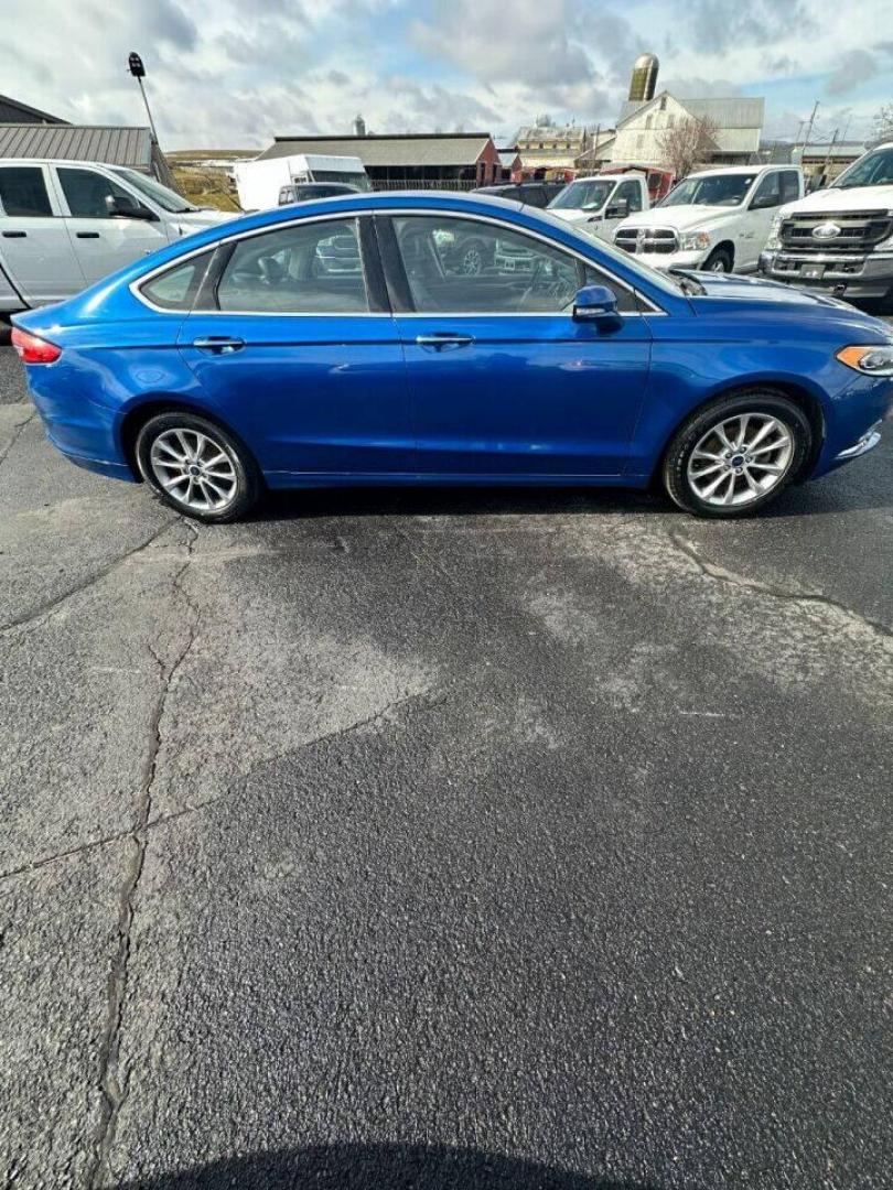 2017 Blue Ford Fusion (3FA6P0HD7HR) with an 1.5L I4 Turbocharger 1.5L I4 engine, located at 4845 Woodbury Pike, Roaring Springs, PA, (814) 317-5008, (814) 317-5008, 40.250935, -78.366959 - Photo#1