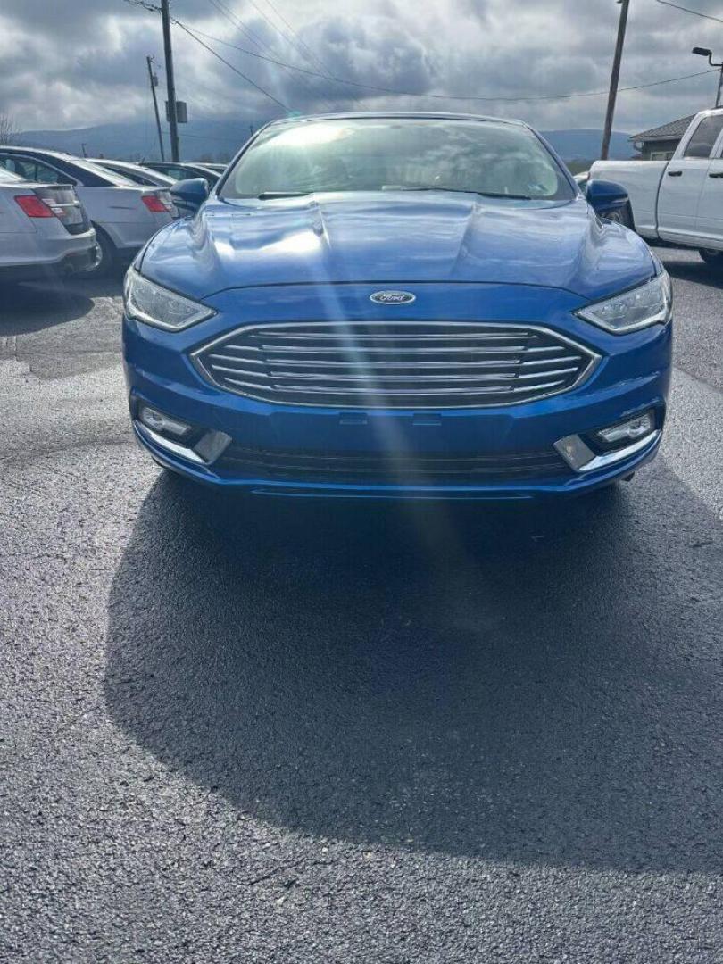 2017 Blue Ford Fusion (3FA6P0HD7HR) with an 1.5L I4 Turbocharger 1.5L I4 engine, located at 4845 Woodbury Pike, Roaring Springs, PA, (814) 317-5008, (814) 317-5008, 40.250935, -78.366959 - Photo#2