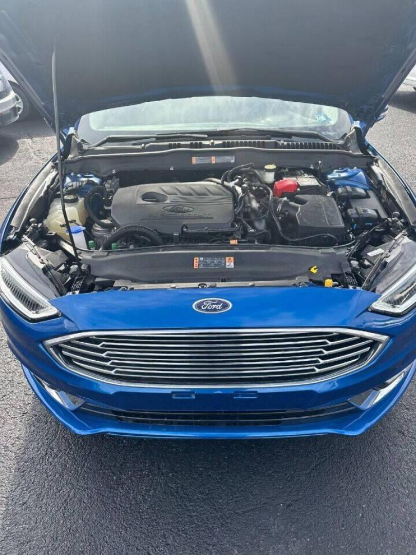 2017 Blue Ford Fusion (3FA6P0HD7HR) with an 1.5L I4 Turbocharger 1.5L I4 engine, located at 4845 Woodbury Pike, Roaring Springs, PA, (814) 317-5008, (814) 317-5008, 40.250935, -78.366959 - Photo#3