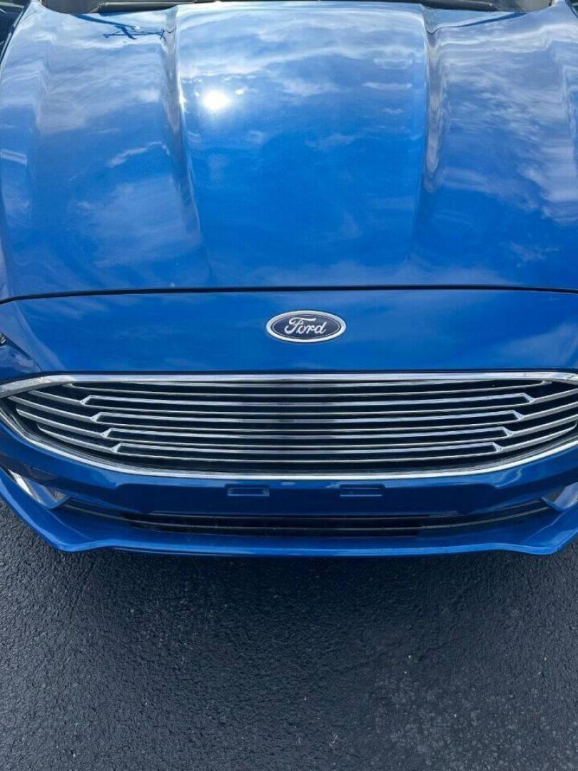 2017 Blue Ford Fusion (3FA6P0HD7HR) with an 1.5L I4 Turbocharger 1.5L I4 engine, located at 4845 Woodbury Pike, Roaring Springs, PA, (814) 317-5008, (814) 317-5008, 40.250935, -78.366959 - Photo#4