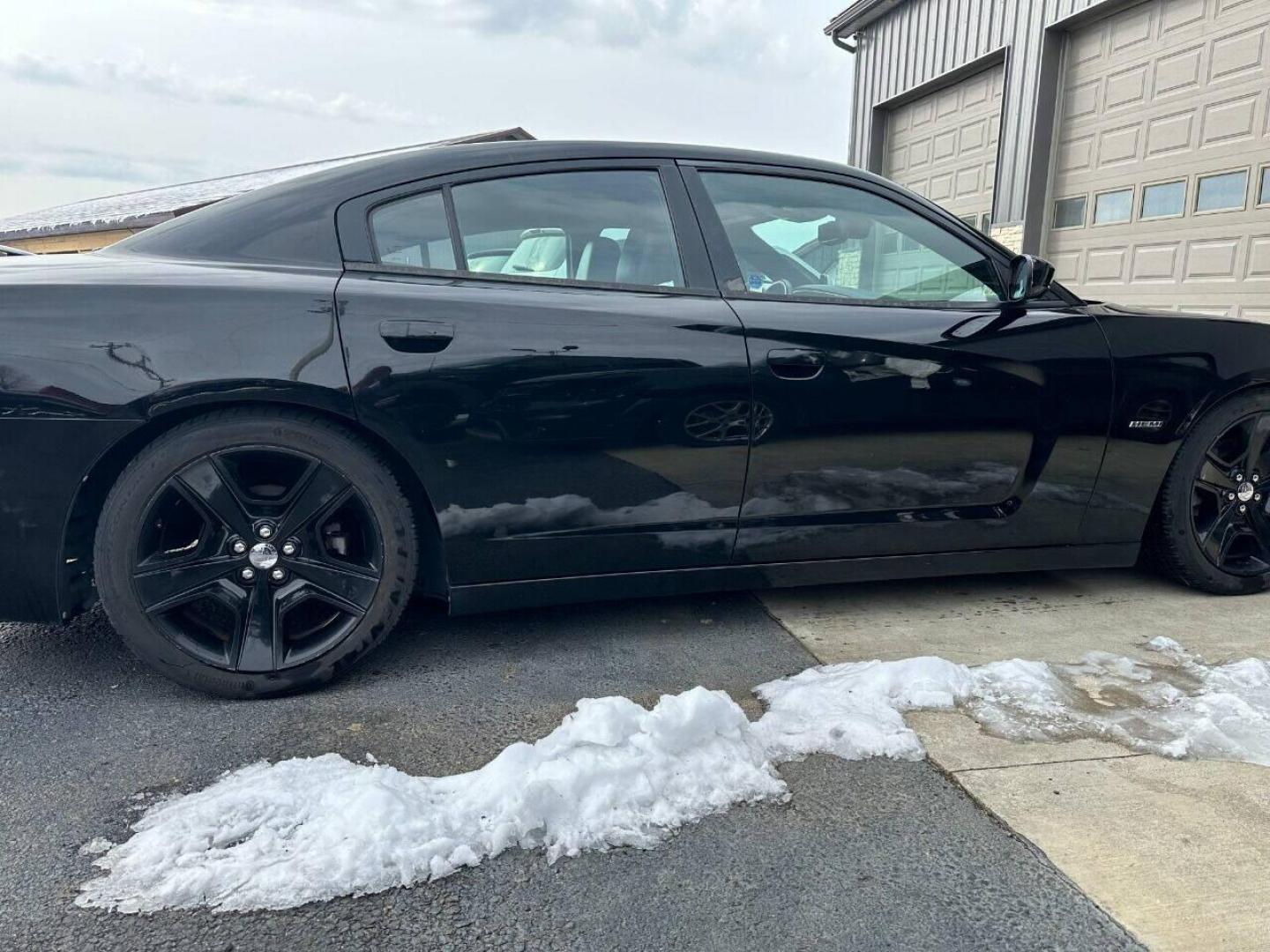 2011 Black Dodge Charger (2B3CL5CT9BH) with an 5.7L V8 5.7L V8 engine, located at 4845 Woodbury Pike, Roaring Springs, PA, (814) 317-5008, (814) 317-5008, 40.250935, -78.366959 - Photo#1