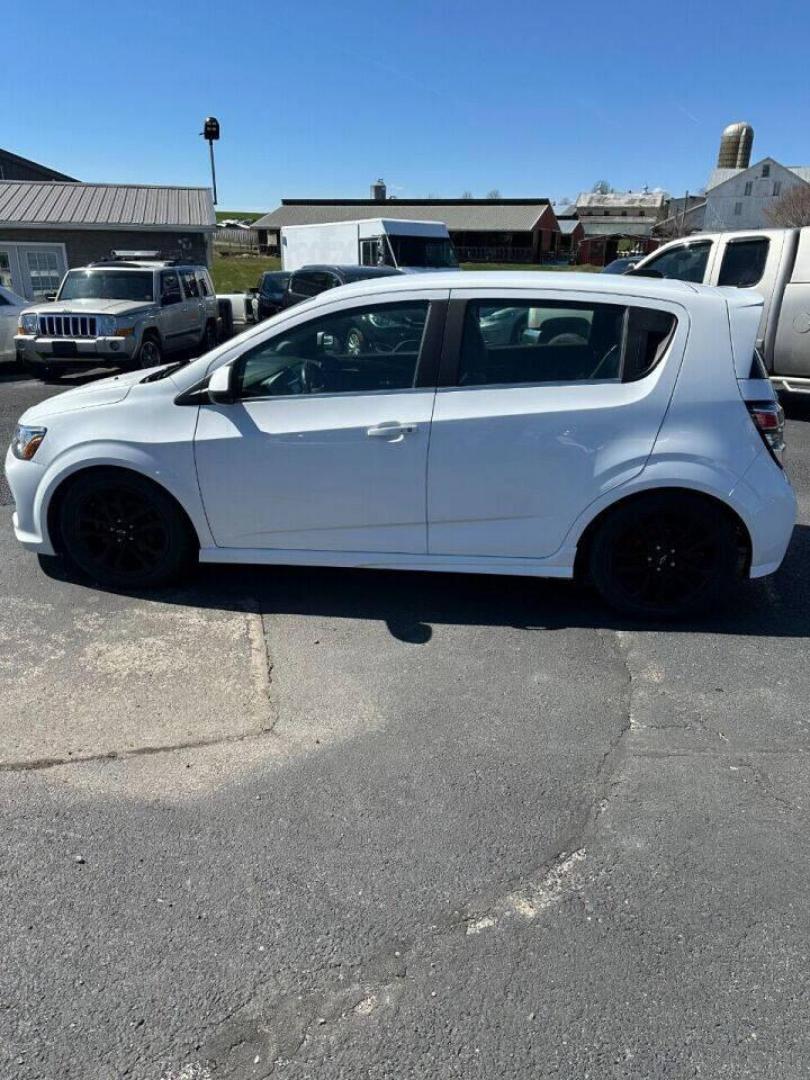 2019 White Chevrolet Sonic (1G1JF6SBXK4) with an 1.4L I4 Turbocharger 1.4L I4 engine, located at 4845 Woodbury Pike, Roaring Springs, PA, (814) 317-5008, (814) 317-5008, 40.250935, -78.366959 - 2019 Chevy Sonic RS package, automatic, FWD, 4 cylinder, Turbocharger, leather, Navigation, rear back up, 32k. Vehicle is extra clean! Vehicle is a Reconstructed title due to light deer damage to front fender and door. Parts were replaced with ones the same color. No paintwork was done! Will com - Photo#0