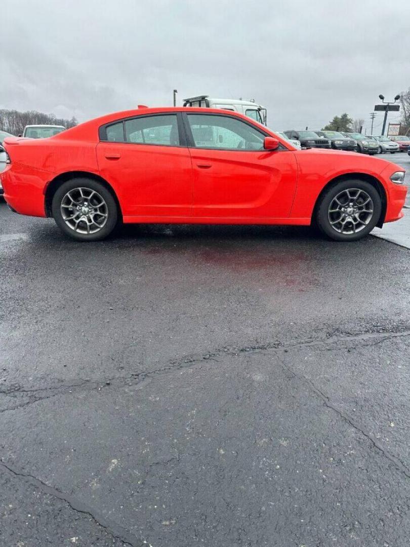 2017 Orange Dodge Charger (2C3CDXJG1HH) with an 3.6L V6 3.6L V6 engine, located at 4845 Woodbury Pike, Roaring Springs, PA, (814) 317-5008, (814) 317-5008, 40.250935, -78.366959 - 2017 Dodge Charger SXT, V6, AWD, 70k, power windows/locks, big screen radio, beats audio system. Super Clean! Vehicle has minor dent on passenger rear door. Will come with a warranty with the option to upgrade. If interested, please call 814-317-5008 or 814-497-4383. - Photo#0