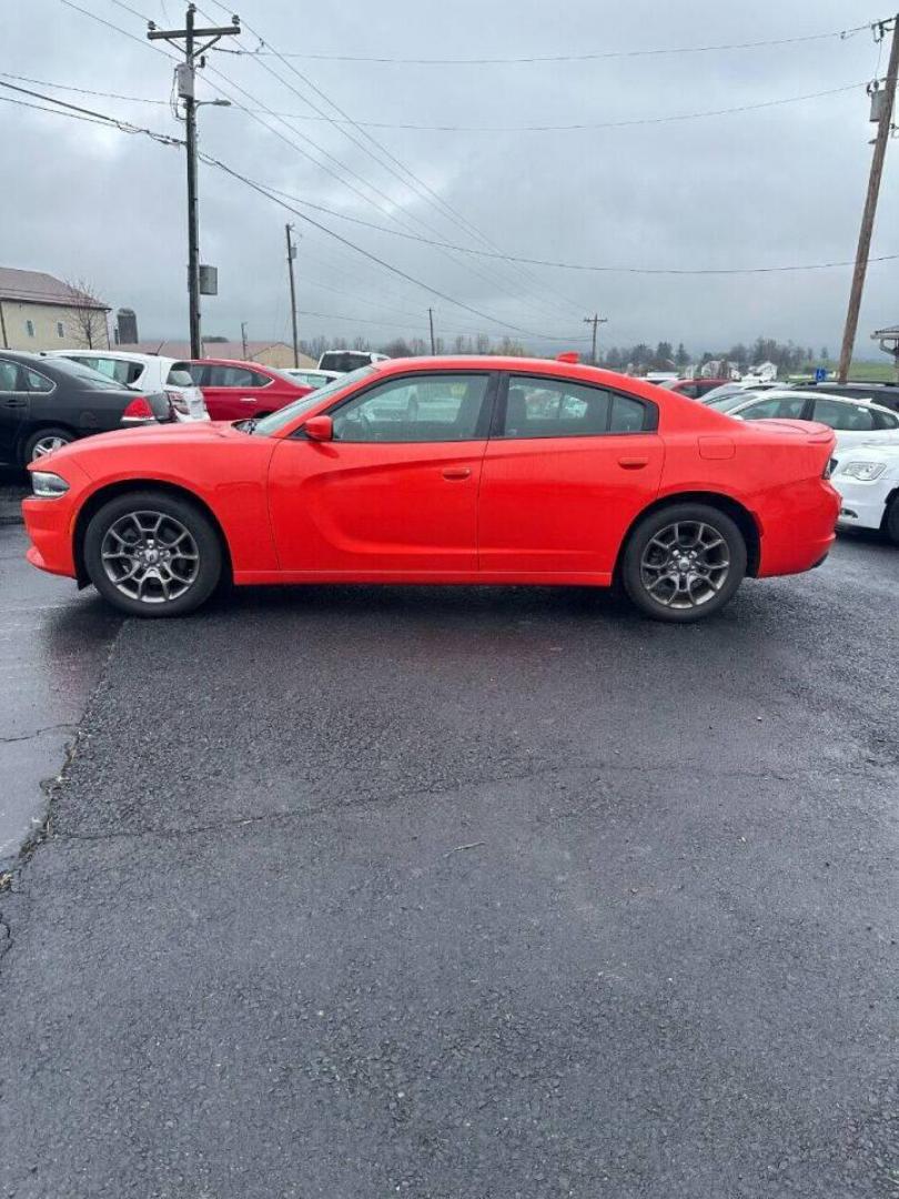 2017 Orange Dodge Charger (2C3CDXJG1HH) with an 3.6L V6 3.6L V6 engine, located at 4845 Woodbury Pike, Roaring Springs, PA, (814) 317-5008, (814) 317-5008, 40.250935, -78.366959 - 2017 Dodge Charger SXT, V6, AWD, 70k, power windows/locks, big screen radio, beats audio system. Super Clean! Vehicle has minor dent on passenger rear door. Will come with a warranty with the option to upgrade. If interested, please call 814-317-5008 or 814-497-4383. - Photo#1