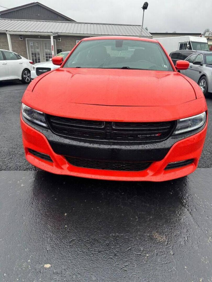 2017 Orange Dodge Charger (2C3CDXJG1HH) with an 3.6L V6 3.6L V6 engine, located at 4845 Woodbury Pike, Roaring Springs, PA, (814) 317-5008, (814) 317-5008, 40.250935, -78.366959 - 2017 Dodge Charger SXT, V6, AWD, 70k, power windows/locks, big screen radio, beats audio system. Super Clean! Vehicle has minor dent on passenger rear door. Will come with a warranty with the option to upgrade. If interested, please call 814-317-5008 or 814-497-4383. - Photo#2