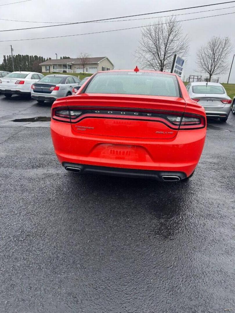 2017 Orange Dodge Charger (2C3CDXJG1HH) with an 3.6L V6 3.6L V6 engine, located at 4845 Woodbury Pike, Roaring Springs, PA, (814) 317-5008, (814) 317-5008, 40.250935, -78.366959 - 2017 Dodge Charger SXT, V6, AWD, 70k, power windows/locks, big screen radio, beats audio system. Super Clean! Vehicle has minor dent on passenger rear door. Will come with a warranty with the option to upgrade. If interested, please call 814-317-5008 or 814-497-4383. - Photo#3