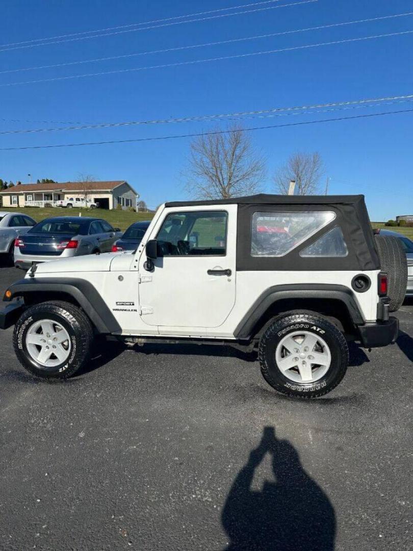 2017 White Jeep Wrangler (1C4AJWAG8HL) with an 3.6L V6 3.6L V6 engine, located at 4845 Woodbury Pike, Roaring Springs, PA, (814) 317-5008, (814) 317-5008, 40.250935, -78.366959 - Photo#0