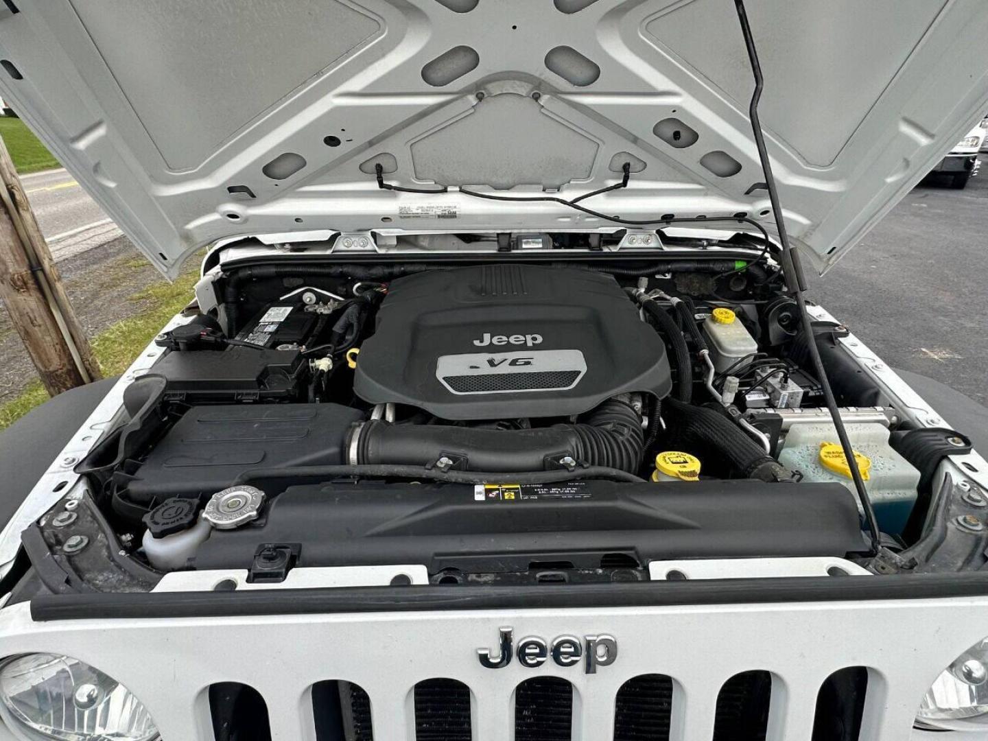 2017 White Jeep Wrangler (1C4AJWAG8HL) with an 3.6L V6 3.6L V6 engine, located at 4845 Woodbury Pike, Roaring Springs, PA, (814) 317-5008, (814) 317-5008, 40.250935, -78.366959 - Photo#10