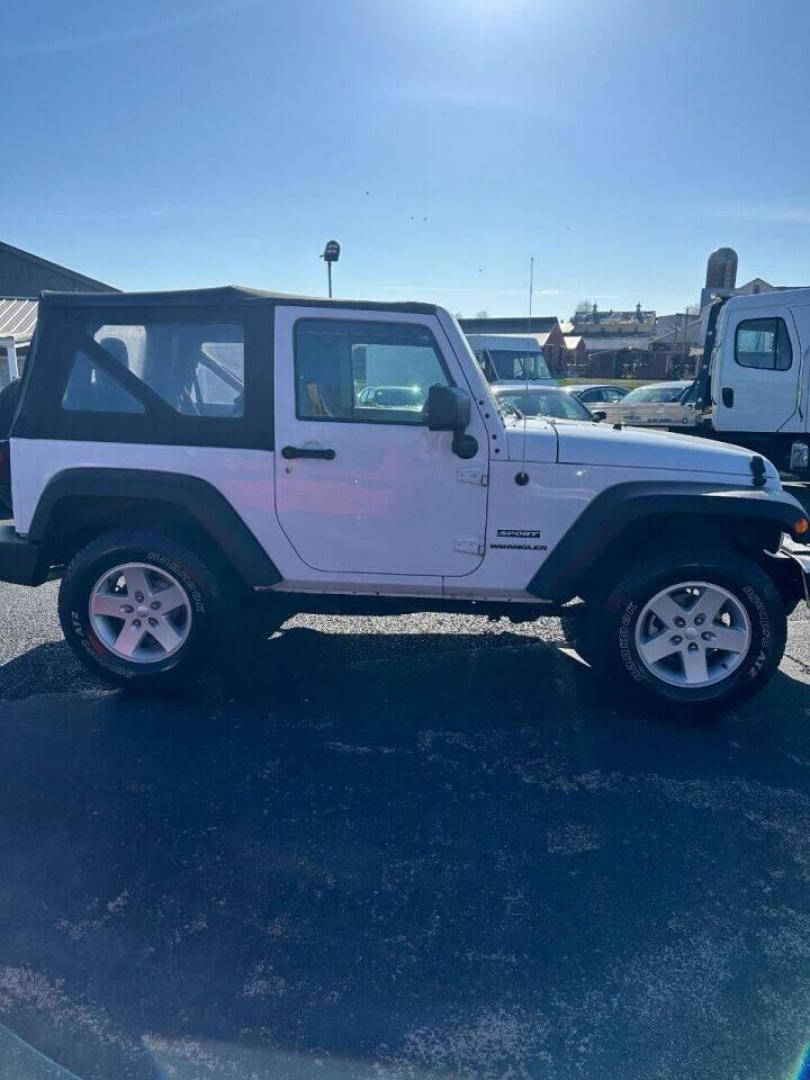 2017 White Jeep Wrangler (1C4AJWAG8HL) with an 3.6L V6 3.6L V6 engine, located at 4845 Woodbury Pike, Roaring Springs, PA, (814) 317-5008, (814) 317-5008, 40.250935, -78.366959 - Photo#1