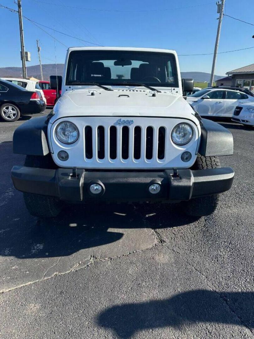 2017 White Jeep Wrangler (1C4AJWAG8HL) with an 3.6L V6 3.6L V6 engine, located at 4845 Woodbury Pike, Roaring Springs, PA, (814) 317-5008, (814) 317-5008, 40.250935, -78.366959 - Photo#2