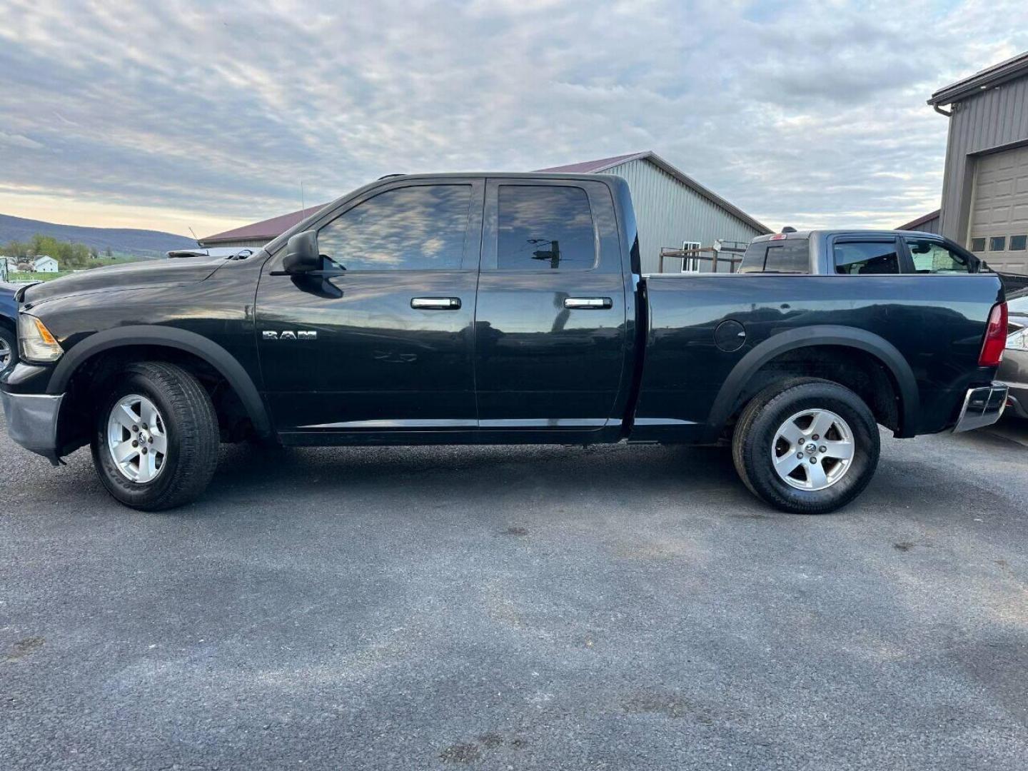 2010 Black Dodge Ram 1500 (1D7RV1GP9AS) with an 4.7L V8 4.7L V8 engine, located at 4845 Woodbury Pike, Roaring Springs, PA, (814) 317-5008, (814) 317-5008, 40.250935, -78.366959 - Photo#1