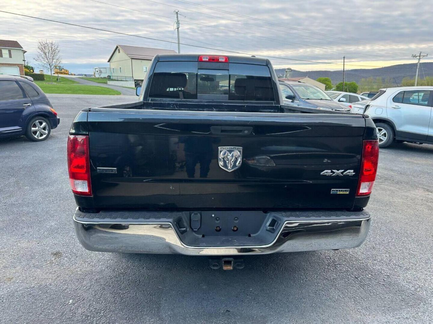 2010 Black Dodge Ram 1500 (1D7RV1GP9AS) with an 4.7L V8 4.7L V8 engine, located at 4845 Woodbury Pike, Roaring Springs, PA, (814) 317-5008, (814) 317-5008, 40.250935, -78.366959 - Photo#2