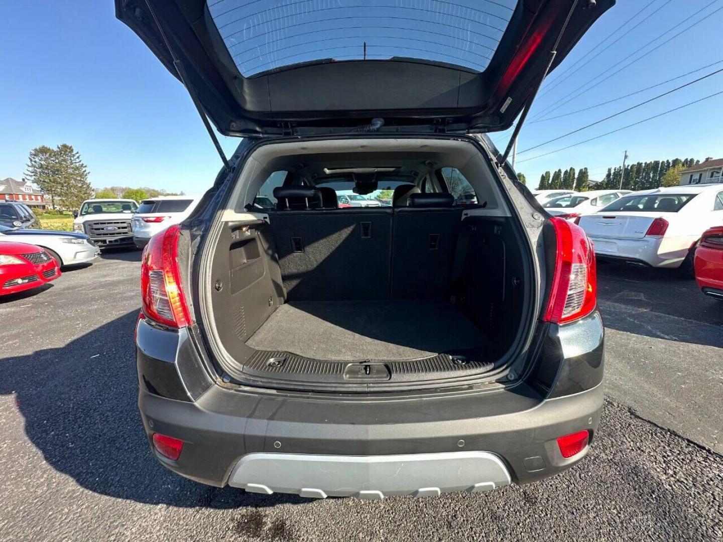 2015 Black Buick Encore (KL4CJHSB4FB) with an 1.4L I4 Turbocharger 1.4L I4 engine, located at 4845 Woodbury Pike, Roaring Springs, PA, (814) 317-5008, (814) 317-5008, 40.250935, -78.366959 - 2015 Buick Encore Premium, AWD, leather, roof, power windows/locks/seats and mirrors, rain sensing windshield, park assist, hands free phone, cruise/tilt wheel and much more. Clean! Ready to go with new inspection! Warranty available! If interested, 814-317-5008 or 814-497-4383. - Photo#11