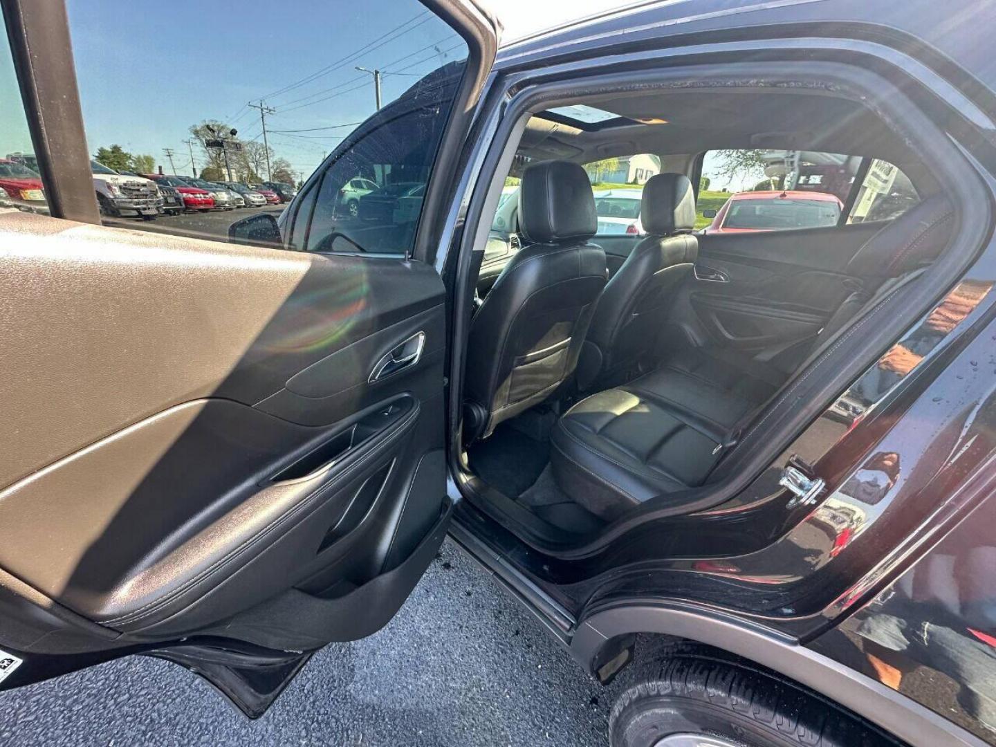 2015 Black Buick Encore (KL4CJHSB4FB) with an 1.4L I4 Turbocharger 1.4L I4 engine, located at 4845 Woodbury Pike, Roaring Springs, PA, (814) 317-5008, (814) 317-5008, 40.250935, -78.366959 - 2015 Buick Encore Premium, AWD, leather, roof, power windows/locks/seats and mirrors, rain sensing windshield, park assist, hands free phone, cruise/tilt wheel and much more. Clean! Ready to go with new inspection! Warranty available! If interested, 814-317-5008 or 814-497-4383. - Photo#5