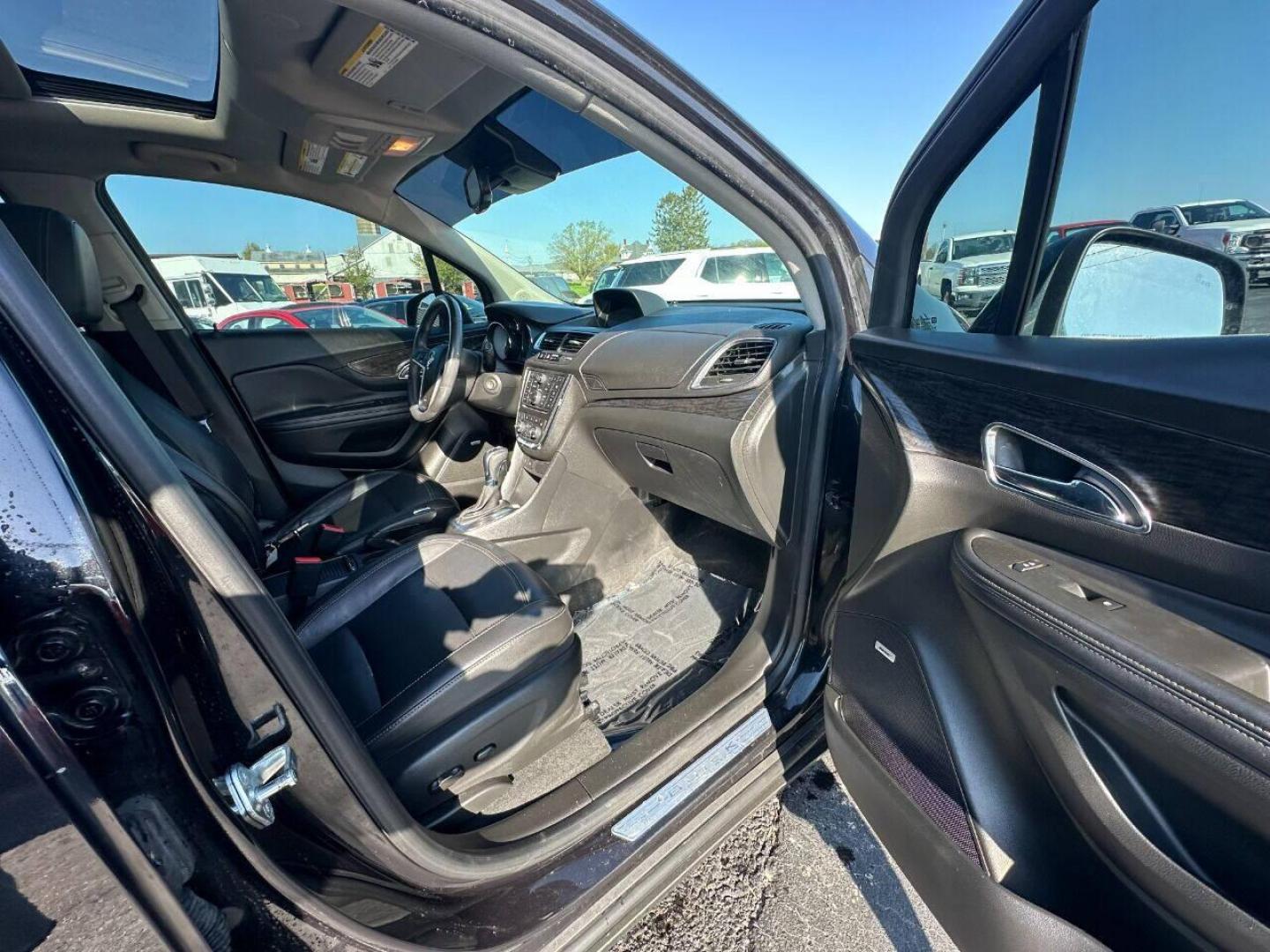 2015 Black Buick Encore (KL4CJHSB4FB) with an 1.4L I4 Turbocharger 1.4L I4 engine, located at 4845 Woodbury Pike, Roaring Springs, PA, (814) 317-5008, (814) 317-5008, 40.250935, -78.366959 - 2015 Buick Encore Premium, AWD, leather, roof, power windows/locks/seats and mirrors, rain sensing windshield, park assist, hands free phone, cruise/tilt wheel and much more. Clean! Ready to go with new inspection! Warranty available! If interested, 814-317-5008 or 814-497-4383. - Photo#6