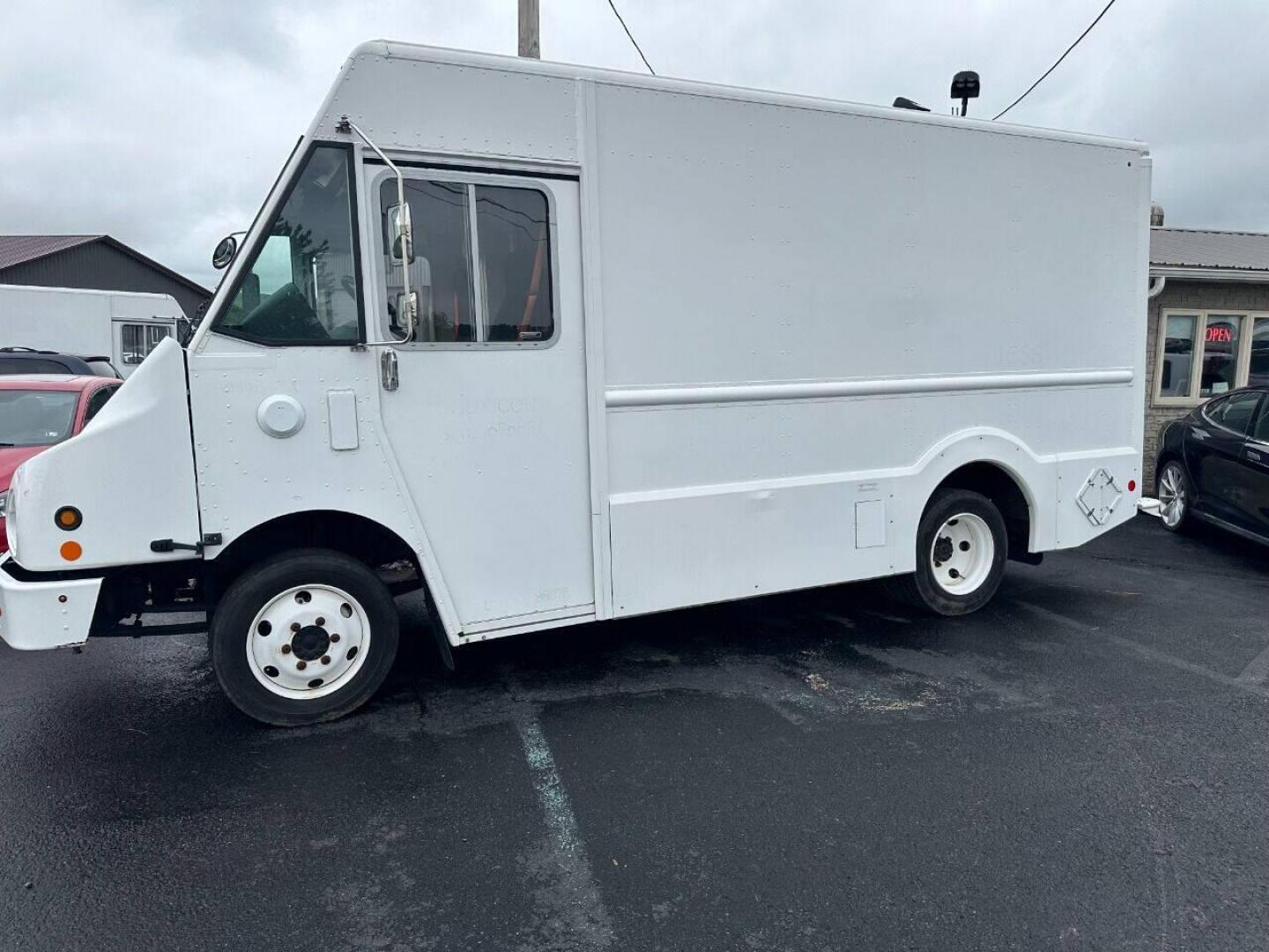 2012 White utility/ Smith Electric Truck (4S9AL5H31CK) with an Unspecified engine, located at 4845 Woodbury Pike, Roaring Springs, PA, (814) 317-5008, (814) 317-5008, 40.250935, -78.366959 - 2012 Electric vehicle! Clean and ready to go! Have six of these to pick from. GVWR is 16,500. Rear back up camera. Average range is 80-100 miles on charge. Average mileage on the seven vehicles are between 2k and 9k. If interested, please call for more information 814-317-5008 or 814-497-4383. - Photo#0