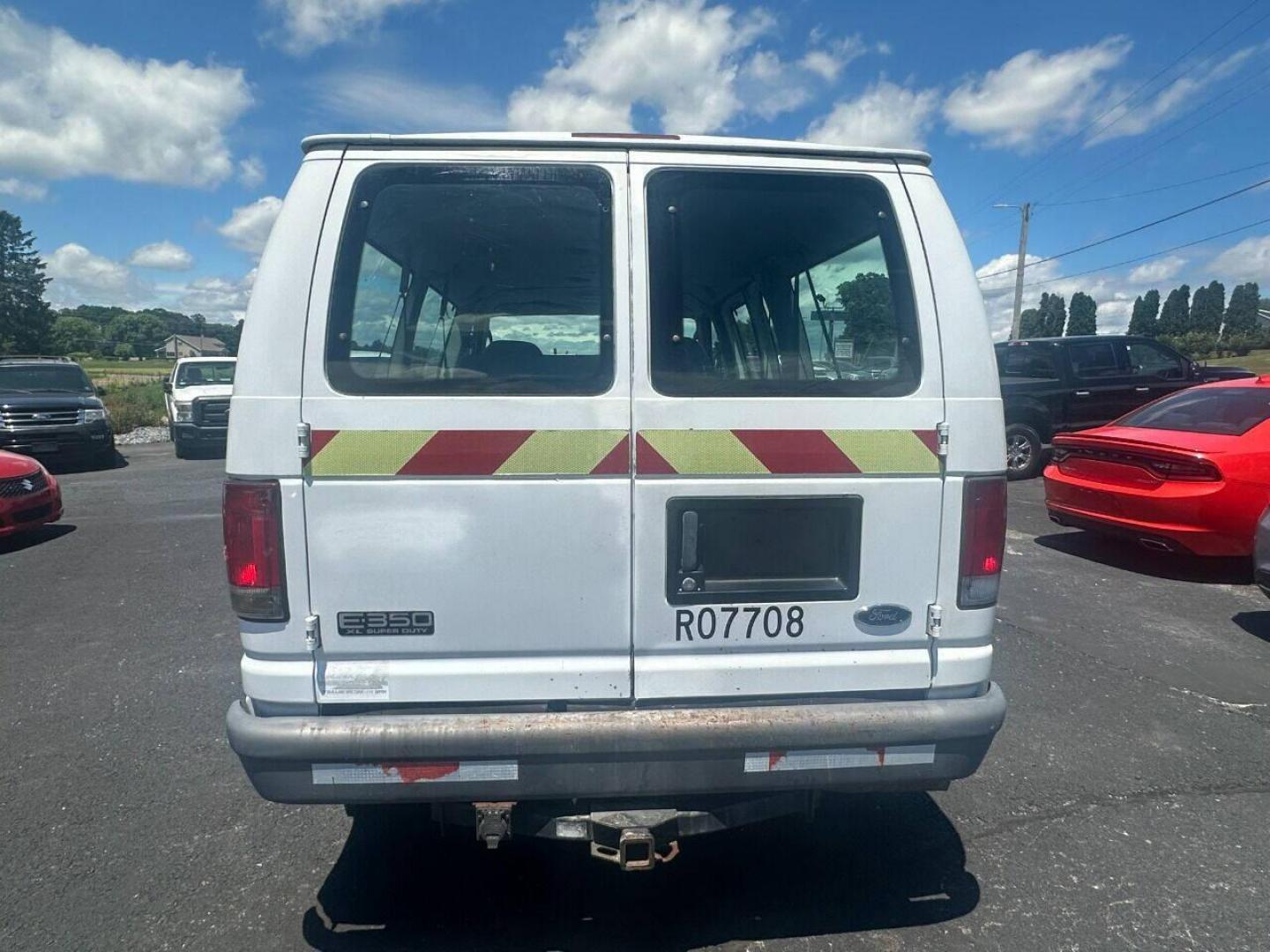 2005 White Ford E-Series (1FMNE31P35H) with an 6.0L V8 Turbocharger 6.0L V8 engine, located at 4845 Woodbury Pike, Roaring Springs, PA, (814) 317-5008, (814) 317-5008, 40.250935, -78.366959 - 2005 Ford E-350, automatic, 6.0 Diesel, RWD, manual windows/locks, air conditioning, good tires, well maintained, clean undercarriage, rust free, vinyl seats and floor. If interested, please call 814-317-5008 or 814-497-4383. - Photo#3