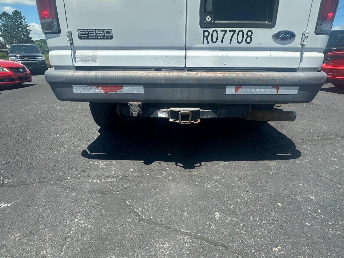 2005 White Ford E-Series (1FMNE31P35H) with an 6.0L V8 Turbocharger 6.0L V8 engine, located at 4845 Woodbury Pike, Roaring Springs, PA, (814) 317-5008, (814) 317-5008, 40.250935, -78.366959 - 2005 Ford E-350, automatic, 6.0 Diesel, RWD, manual windows/locks, air conditioning, good tires, well maintained, clean undercarriage, rust free, vinyl seats and floor. If interested, please call 814-317-5008 or 814-497-4383. - Photo#4