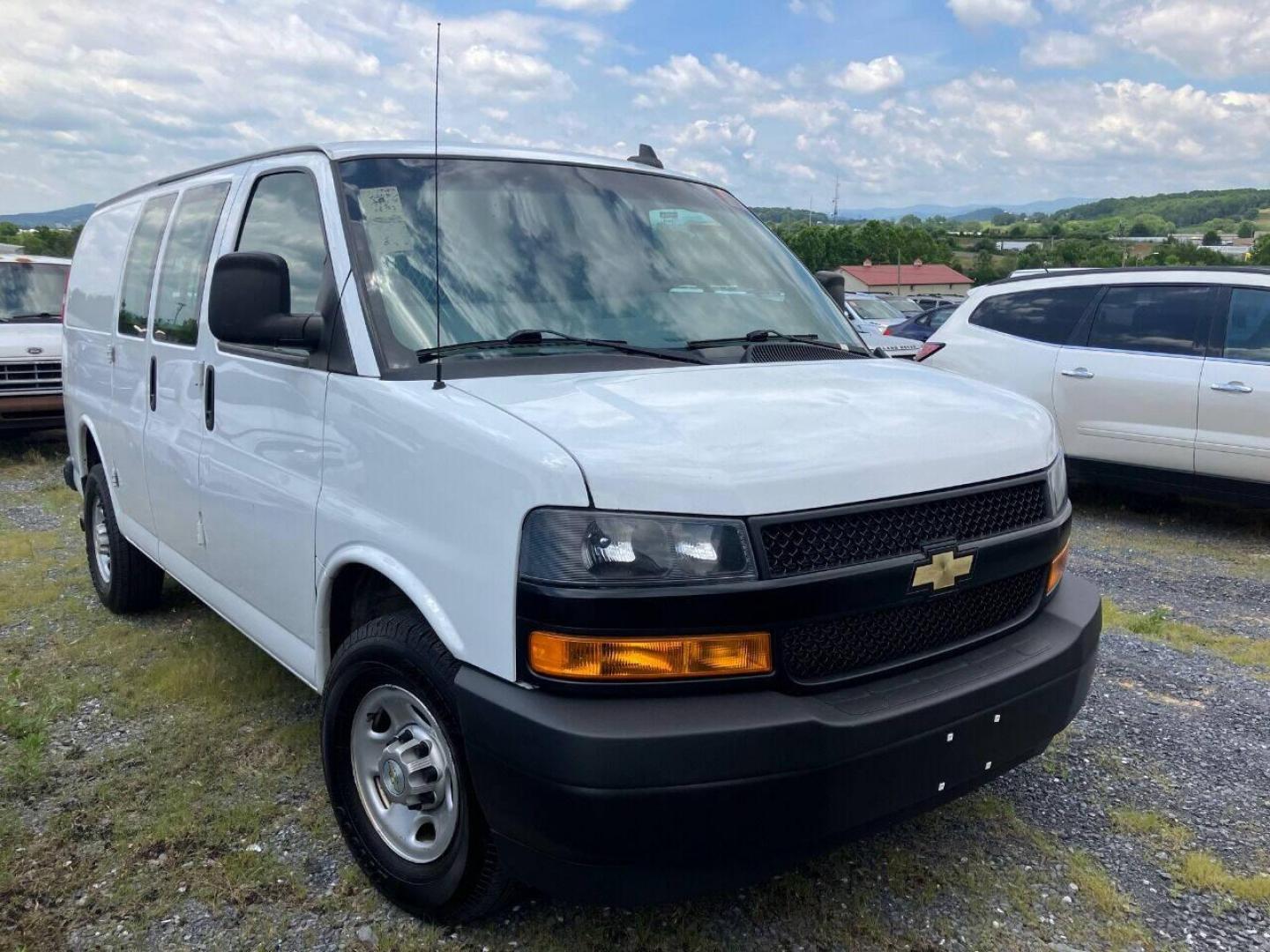 2021 White Chevrolet Express (1GCWGAF70M1) with an 6.6L V8 6.6L V8 engine, located at 4845 Woodbury Pike, Roaring Springs, PA, (814) 317-5008, (814) 317-5008, 40.250935, -78.366959 - 2021 Chevrolet express 2500 cargo van, 6.6 l v8 rear wheel drive, automatic transmission, vinyl floor and seating, power windows and locks, air conditioning, back up camera, blind spot monitoring, rear parking aid and tire monitoring. well maintained company vehicle southern van rust free if inter - Photo#1