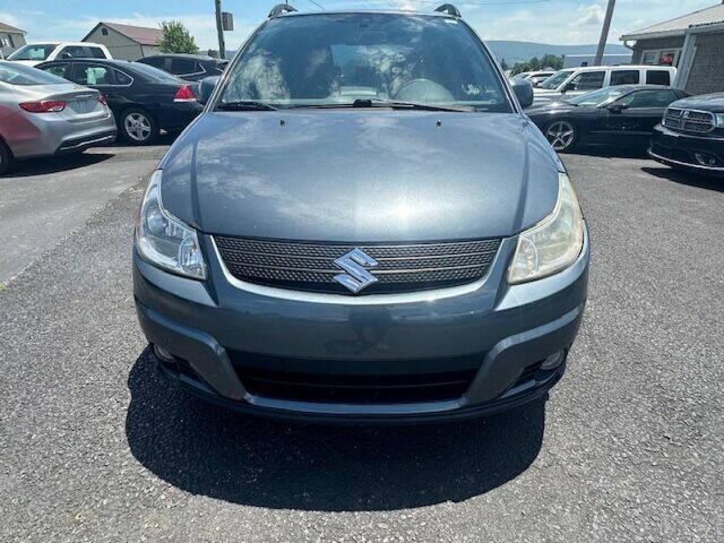 2009 Gray Suzuki SX4 Crossover (JS2YB413496) with an 2.0L I4 2.0L I4 engine, located at 4845 Woodbury Pike, Roaring Springs, PA, (814) 317-5008, (814) 317-5008, 40.250935, -78.366959 - 2009 SUZUKI SX4 ALL WHEEL DRIVE 5 SPEED MANUL TRANMISSION A/C BEING SOLD AT A LOW COST DUE TO BEING A RECONSTRUCTED DAMAGE IS SEEN IN PICTURES OF DOOR AND FENDER, THE ENHANCED INSPECTION IS DONE AND THE STATE INSPECTION ALSO. VEHICLE RUNS AND DRIVES 100% VEHICLE IS BEING SOLD AS IS IF INTERESTE - Photo#0