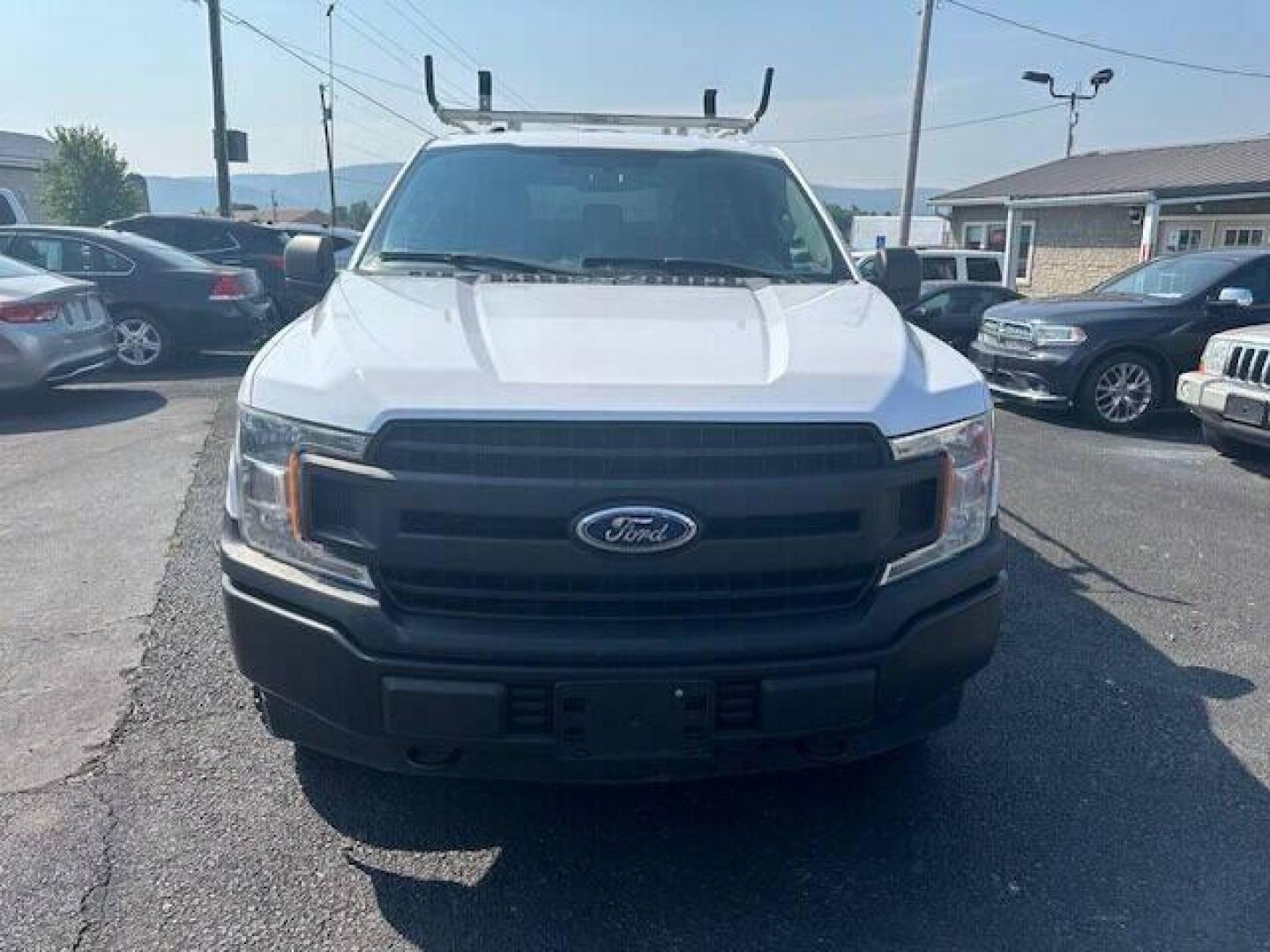 2018 White Ford F-150 (1FTMF1E51JK) with an 5.0L V8 5.0L V8 engine, located at 4845 Woodbury Pike, Roaring Springs, PA, (814) 317-5008, (814) 317-5008, 40.250935, -78.366959 - 2018 FORD F15 XL TRUCK 5.0 L 4WD AUTOMATIC TRANSMISSIOM A/C, CLOTH SEATS VINYL FLOORING. SLIDE OUT TRAY IN BED, CAP MOUNTED SIDE TOOL BOXS AND LADDER RACK ON TOP. GOOD TIRES AND NEW INSPECTION. VERY CLEAN SOUTHERN TRUCK RUST FREE. IF INTERSTED CALL 814-317-5008 GUARANTEED TO BE THE LOWEST PRICE ARO - Photo#0