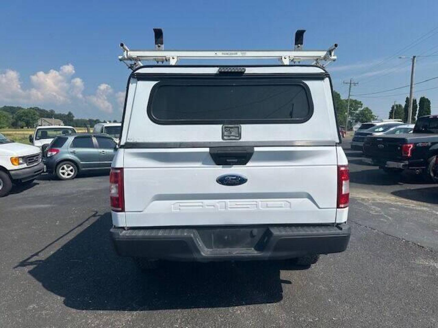 2018 White Ford F-150 (1FTMF1E51JK) with an 5.0L V8 5.0L V8 engine, located at 4845 Woodbury Pike, Roaring Springs, PA, (814) 317-5008, (814) 317-5008, 40.250935, -78.366959 - 2018 FORD F15 XL TRUCK 5.0 L 4WD AUTOMATIC TRANSMISSIOM A/C, CLOTH SEATS VINYL FLOORING. SLIDE OUT TRAY IN BED, CAP MOUNTED SIDE TOOL BOXS AND LADDER RACK ON TOP. GOOD TIRES AND NEW INSPECTION. VERY CLEAN SOUTHERN TRUCK RUST FREE. IF INTERSTED CALL 814-317-5008 GUARANTEED TO BE THE LOWEST PRICE ARO - Photo#9