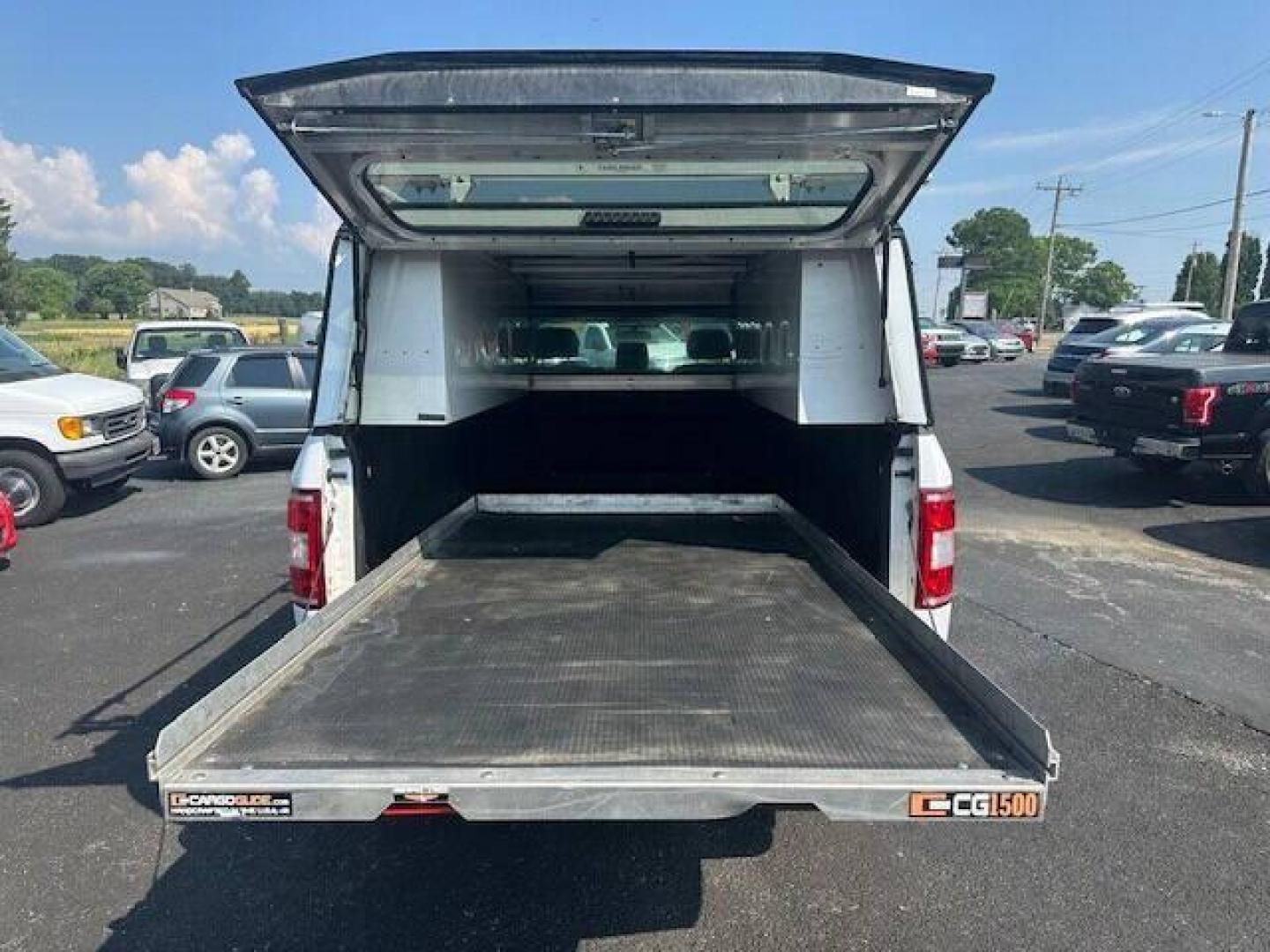 2018 White Ford F-150 (1FTMF1E51JK) with an 5.0L V8 5.0L V8 engine, located at 4845 Woodbury Pike, Roaring Springs, PA, (814) 317-5008, (814) 317-5008, 40.250935, -78.366959 - 2018 FORD F15 XL TRUCK 5.0 L 4WD AUTOMATIC TRANSMISSIOM A/C, CLOTH SEATS VINYL FLOORING. SLIDE OUT TRAY IN BED, CAP MOUNTED SIDE TOOL BOXS AND LADDER RACK ON TOP. GOOD TIRES AND NEW INSPECTION. VERY CLEAN SOUTHERN TRUCK RUST FREE. IF INTERSTED CALL 814-317-5008 GUARANTEED TO BE THE LOWEST PRICE ARO - Photo#10