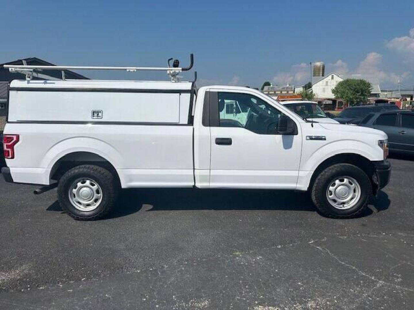 2018 White Ford F-150 (1FTMF1E51JK) with an 5.0L V8 5.0L V8 engine, located at 4845 Woodbury Pike, Roaring Springs, PA, (814) 317-5008, (814) 317-5008, 40.250935, -78.366959 - 2018 FORD F15 XL TRUCK 5.0 L 4WD AUTOMATIC TRANSMISSIOM A/C, CLOTH SEATS VINYL FLOORING. SLIDE OUT TRAY IN BED, CAP MOUNTED SIDE TOOL BOXS AND LADDER RACK ON TOP. GOOD TIRES AND NEW INSPECTION. VERY CLEAN SOUTHERN TRUCK RUST FREE. IF INTERSTED CALL 814-317-5008 GUARANTEED TO BE THE LOWEST PRICE ARO - Photo#3