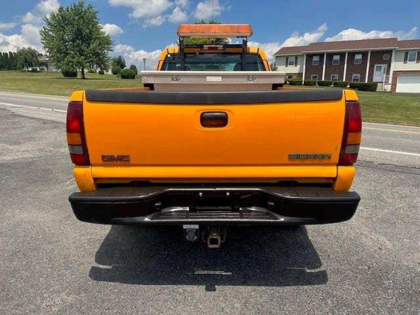 2001 Orange GMC Sierra 2500HD (1GTHC24151E) with an 6.6L V8 Turbocharger 6.6L V8 engine, located at 4845 Woodbury Pike, Roaring Springs, PA, (814) 317-5008, (814) 317-5008, 40.250935, -78.366959 - Photo#2