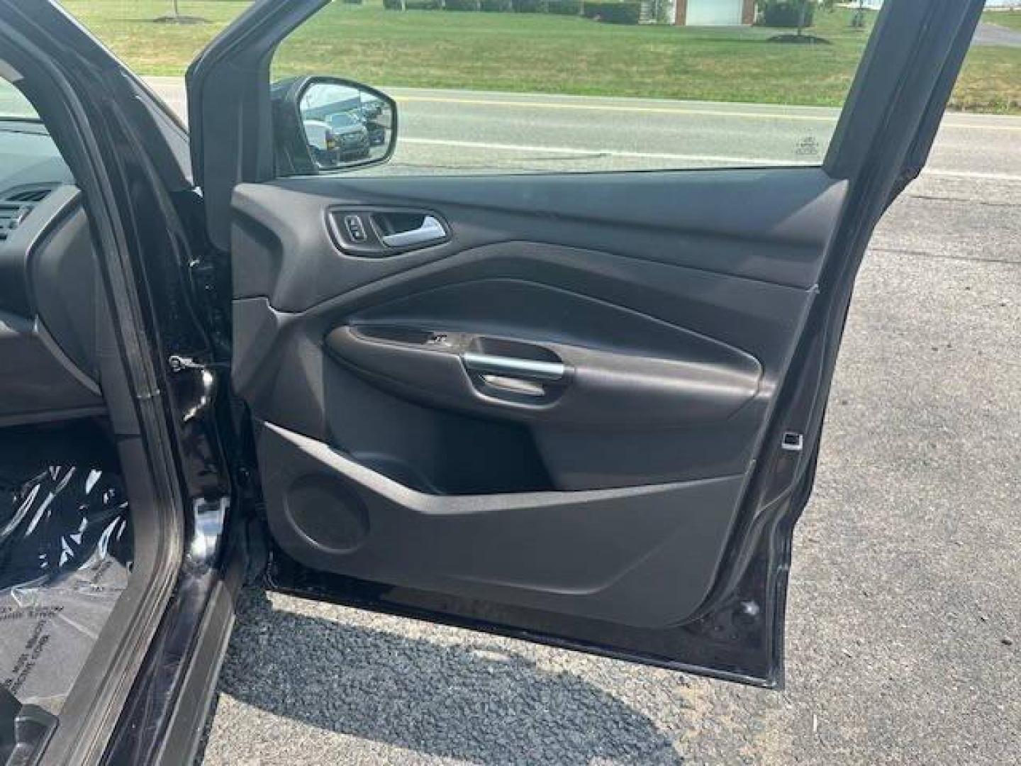 2019 Black Ford Escape (1FMCU9GDXKU) with an 1.5L I4 Turbocharger 1.5L I4 engine, located at 4845 Woodbury Pike, Roaring Springs, PA, (814) 317-5008, (814) 317-5008, 40.250935, -78.366959 - 2019 FORD ESCAPE AWD 1.5 L I4 TURBO ALL WHEEL DRIVE, BLACK OUT PACKAGE AUTOMATIC TRANSMISSION A/C ALL LEATHER AND HEATED SEATS.NAVIGATION POWER GATE POWER WINDOWS AND LOCKS SIRIUS RADIO.BACK UP CAMERA BLACK WHEELS BLUE TOOTH. GOOD TIRES RUN GREAT NEW INSPECTION BEING SOLD AT LOWER COST DUE TO DAMAGE - Photo#10