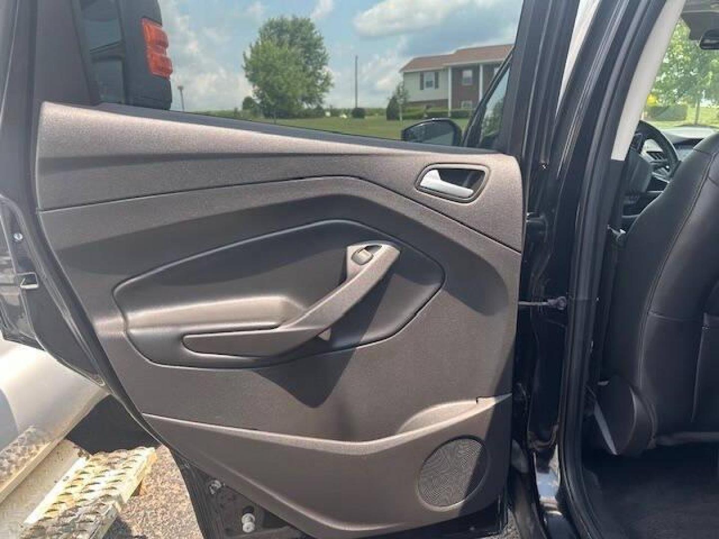 2019 Black Ford Escape (1FMCU9GDXKU) with an 1.5L I4 Turbocharger 1.5L I4 engine, located at 4845 Woodbury Pike, Roaring Springs, PA, (814) 317-5008, (814) 317-5008, 40.250935, -78.366959 - 2019 FORD ESCAPE AWD 1.5 L I4 TURBO ALL WHEEL DRIVE, BLACK OUT PACKAGE AUTOMATIC TRANSMISSION A/C ALL LEATHER AND HEATED SEATS.NAVIGATION POWER GATE POWER WINDOWS AND LOCKS SIRIUS RADIO.BACK UP CAMERA BLACK WHEELS BLUE TOOTH. GOOD TIRES RUN GREAT NEW INSPECTION BEING SOLD AT LOWER COST DUE TO DAMAGE - Photo#12