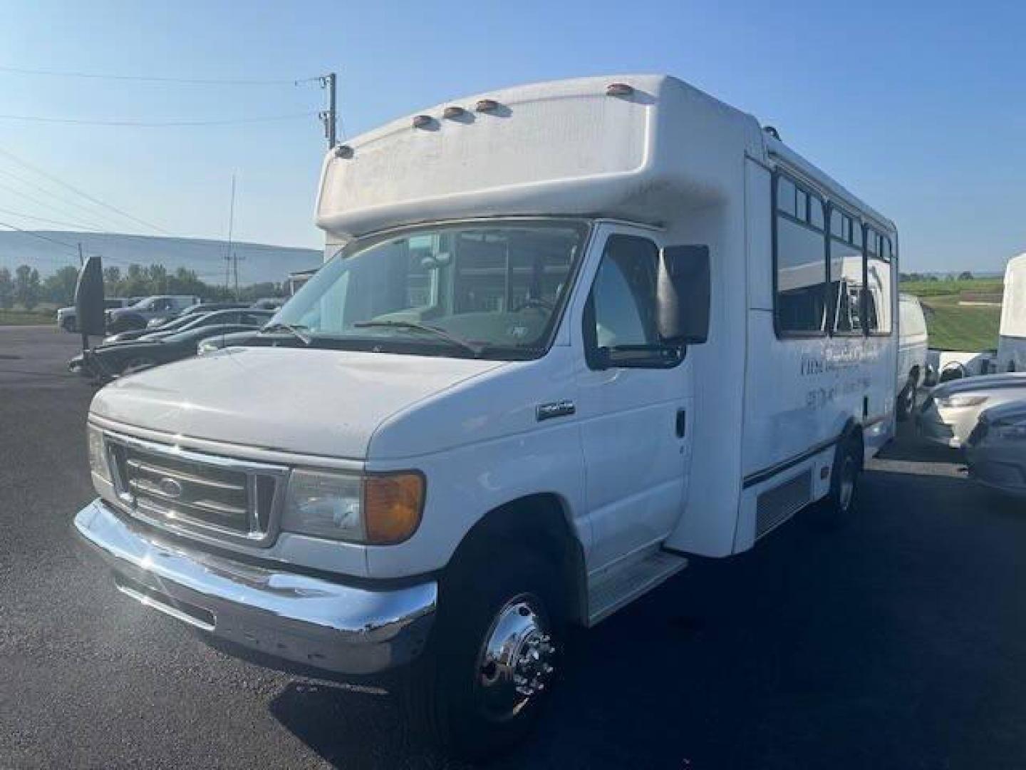 2007 White Ford E-Series (1FDXE45S77D) with an 6.8L V10 6.8L V10 engine, located at 4845 Woodbury Pike, Roaring Springs, PA, (814) 317-5008, (814) 317-5008, 40.250935, -78.366959 - Photo#0