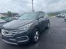 2018 Black Hyundai Santa Fe Sport (5XYZTDLB2JG) with an 2.4L I4 2.4L I4 engine, located at 4845 Woodbury Pike, Roaring Springs, PA, (814) 317-5008, (814) 317-5008, 40.250935, -78.366959 - Photo#0