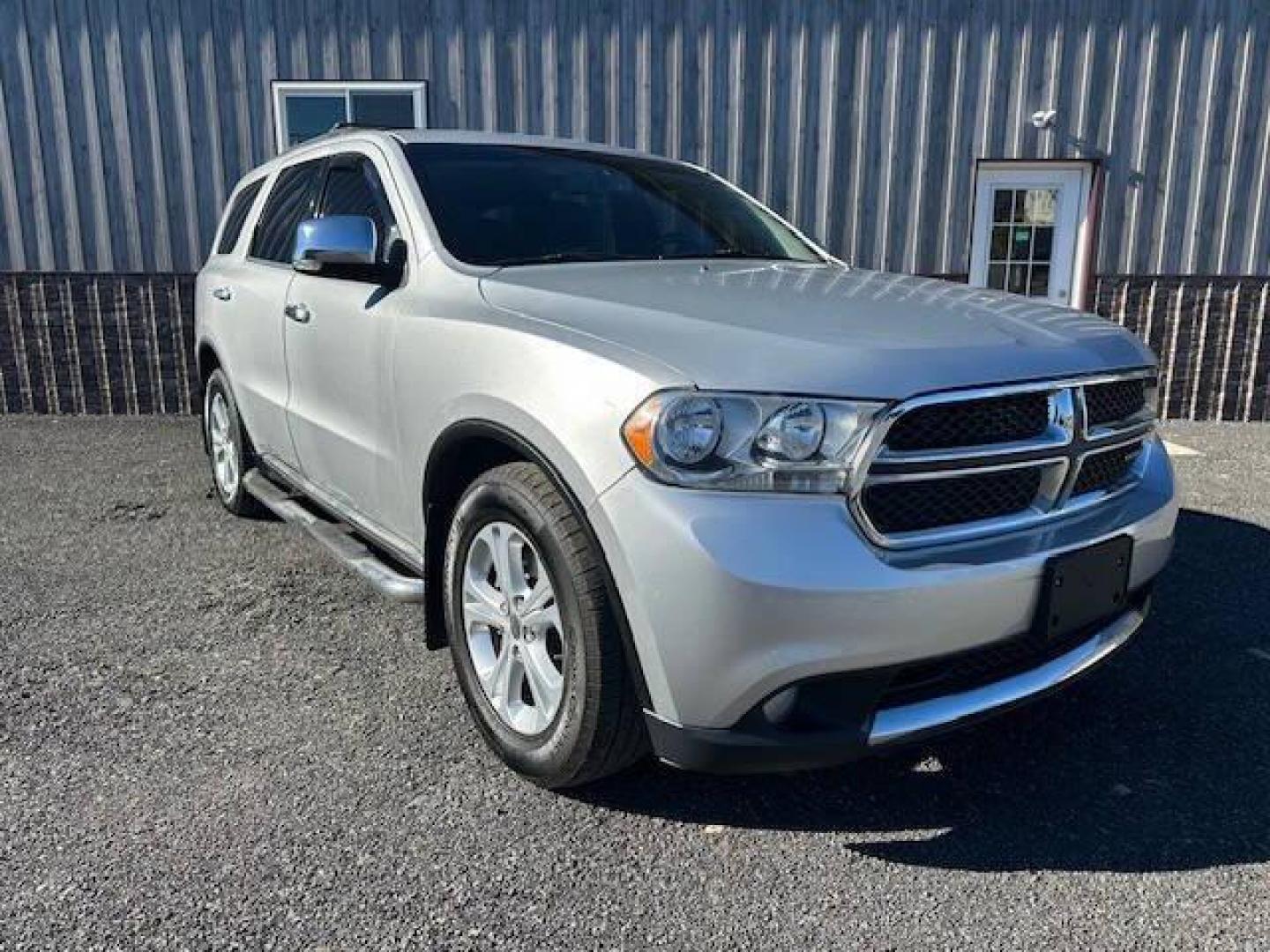 2011 Silver Dodge Durango (1D4RE4GGXBC) with an 3.6L V6 3.6L V6 engine, located at 4845 Woodbury Pike, Roaring Springs, PA, (814) 317-5008, (814) 317-5008, 40.250935, -78.366959 - 2011 Dodge Durango Crew 3.6 l engine 5 speed automatic transmission, AWD flex fuel 3rd row seating power windows seats, heated seats front and rear and door locks, tow package newer tires alloy wheels, new state inspection. stop by or give a call at 814-317-5008 - Photo#0