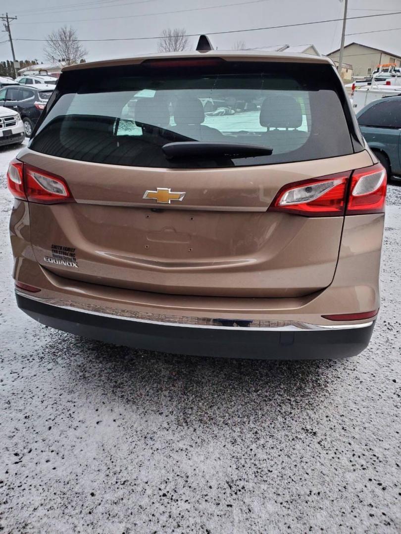 2018 Champagne Chevrolet Equinox (2GNAXHEV3J6) with an 1.5L I4 Turbocharger 1.5L I4 engine, located at 4845 Woodbury Pike, Roaring Springs, PA, (814) 317-5008, (814) 317-5008, 40.250935, -78.366959 - 2018 Chevrolet Equinox 6-speed Automatic 4 Cyl. Fuel-efficient Turbocharged Engine FWD PW, PL, Rear Back-up Camera, Hands-Free Phone, Android Auto/Apple CarPlay, Satellite radio, Hands-free Entry, Heated Mirrors, Alloy Wheels, Southern Vehicle. This vehicle comes with a 3 month/4500-mile power train - Photo#2