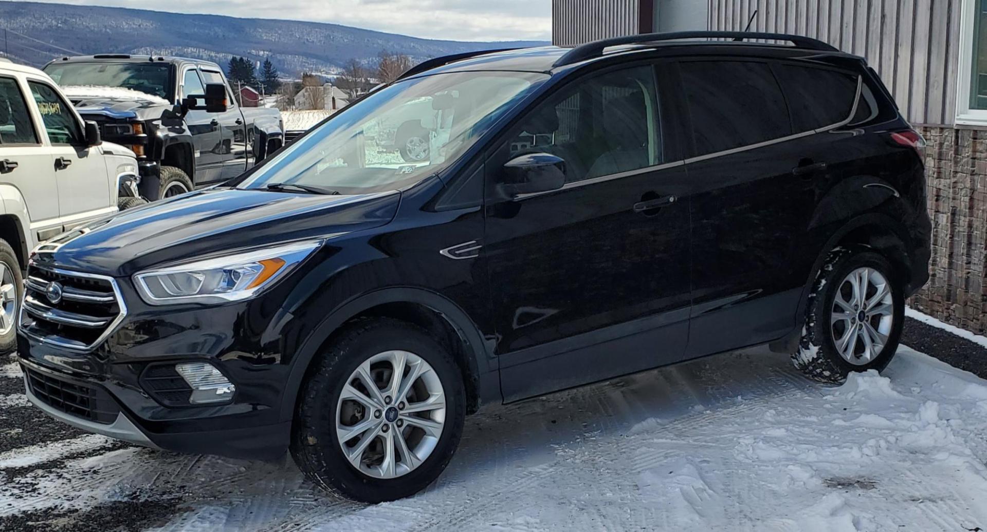 2018 Ford Escape SEL 4WD (1FMCU9HD0JU) with an 1.5L L4 DOHC 16V engine, 6A transmission, located at 4845 Woodbury Pike, Roaring Springs, PA, (814) 317-5008, (814) 317-5008, 40.250935, -78.366959 - Photo#4