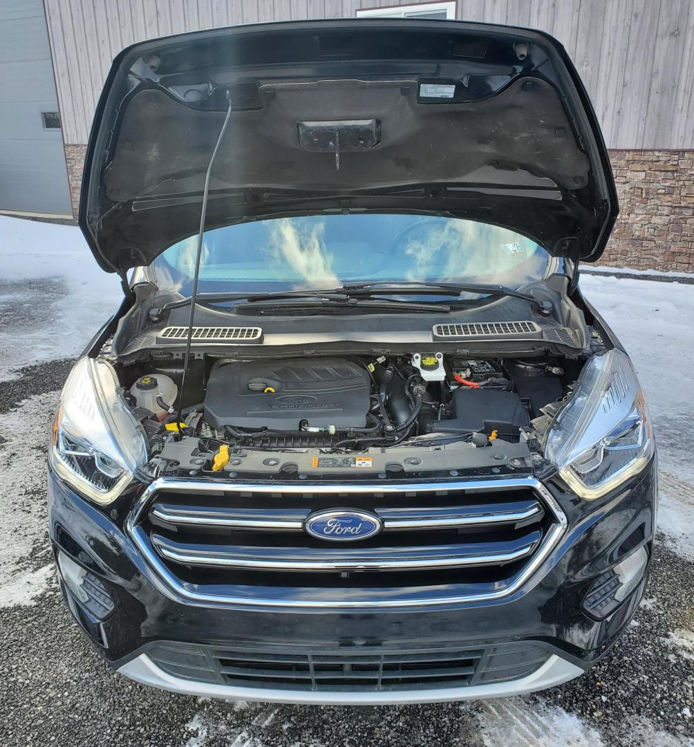 2018 Ford Escape SEL 4WD (1FMCU9HD0JU) with an 1.5L L4 DOHC 16V engine, 6A transmission, located at 4845 Woodbury Pike, Roaring Springs, PA, (814) 317-5008, (814) 317-5008, 40.250935, -78.366959 - Photo#5